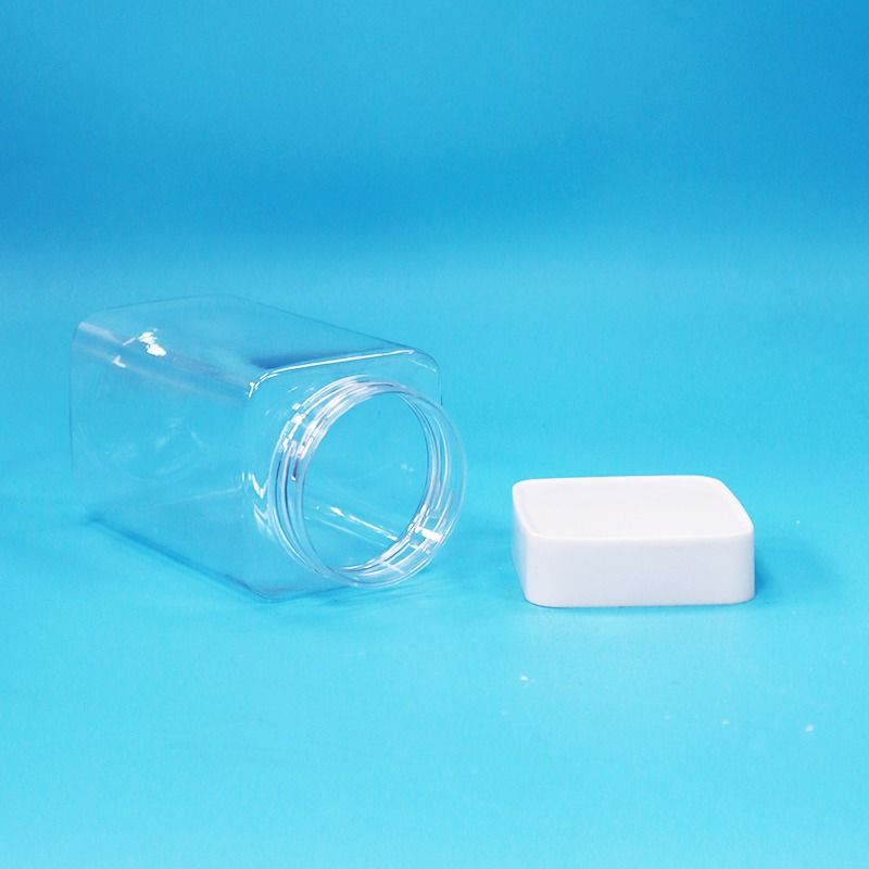 Chất lượng thực phẩm Trình vuông trong suốt PET rỗng nhựa thực phẩm kẹo bánh quy kẹo Jar trắng nắp