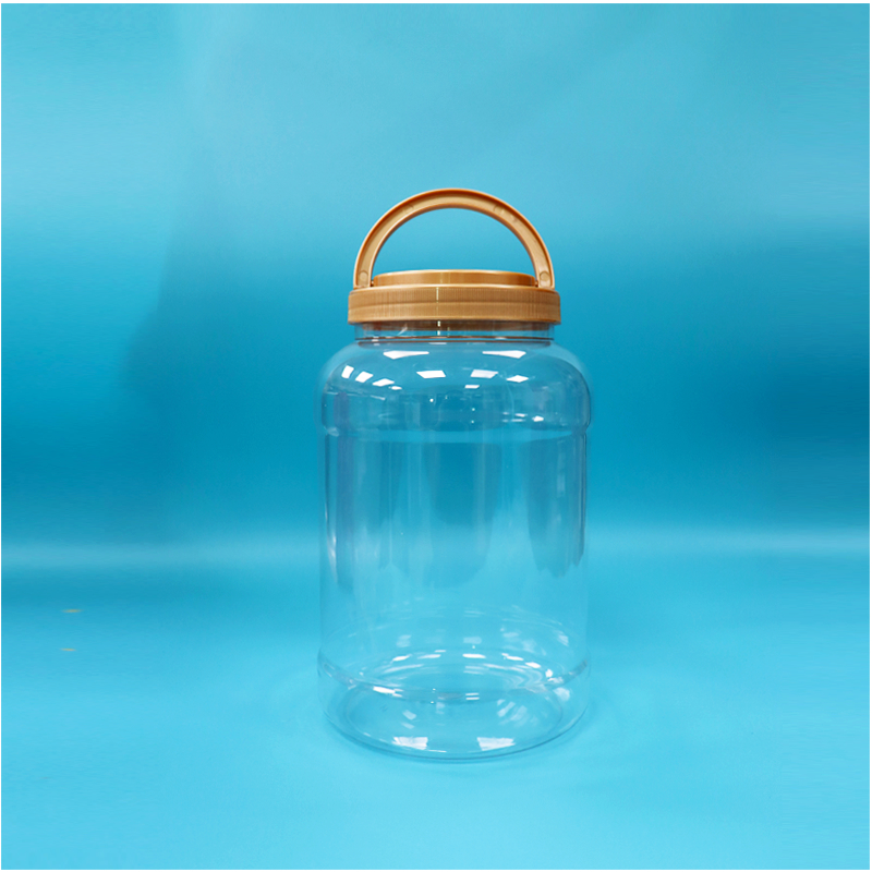 Bình sữa bột bằng nhựa PET trong suốt, nắp có tay cầm, không chứa BPA, miệng rộng, hình tròn, có muỗng