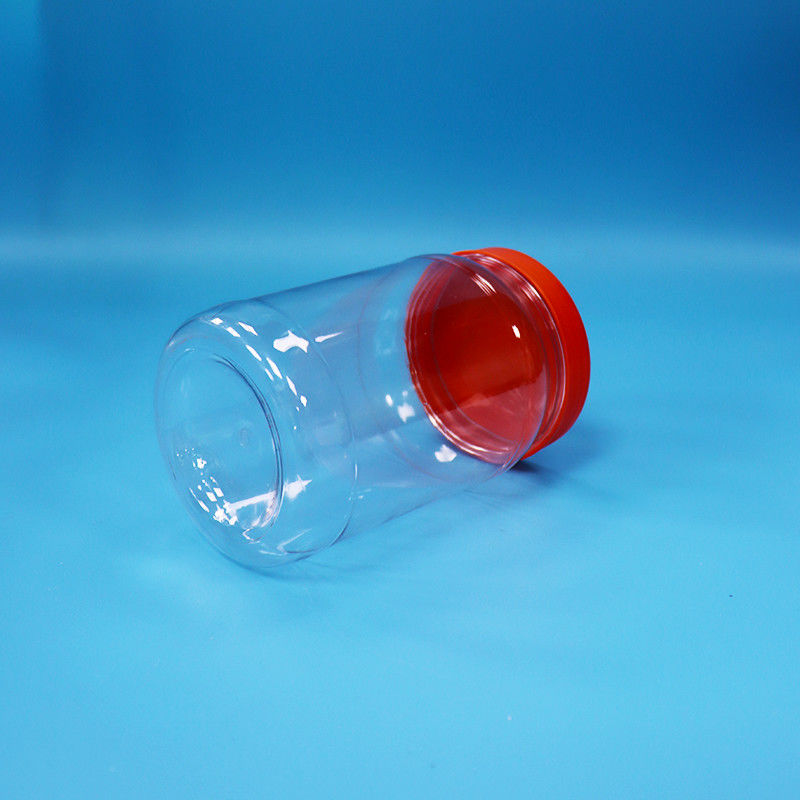 Nhìn qua PET nhựa tròn thực phẩm kẹo bánh quy đóng gói bình màu đỏ nắp vít