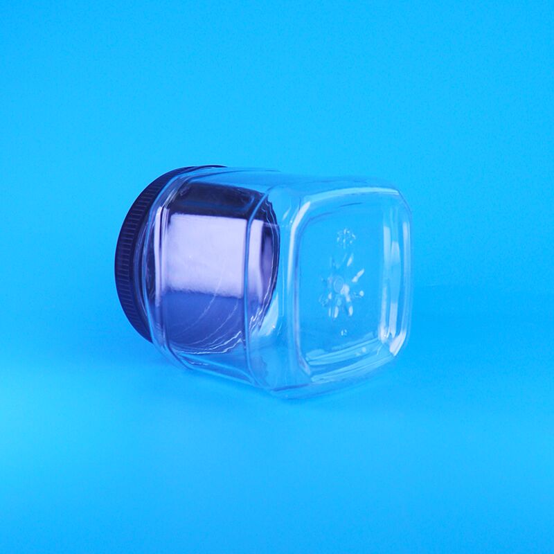 Hũ đựng bằng nhựa trong suốt hình vuông có nắp vặn không khí, dùng để đựng đồ ăn nhẹ, nho khô, đậu rộng, hạt thông